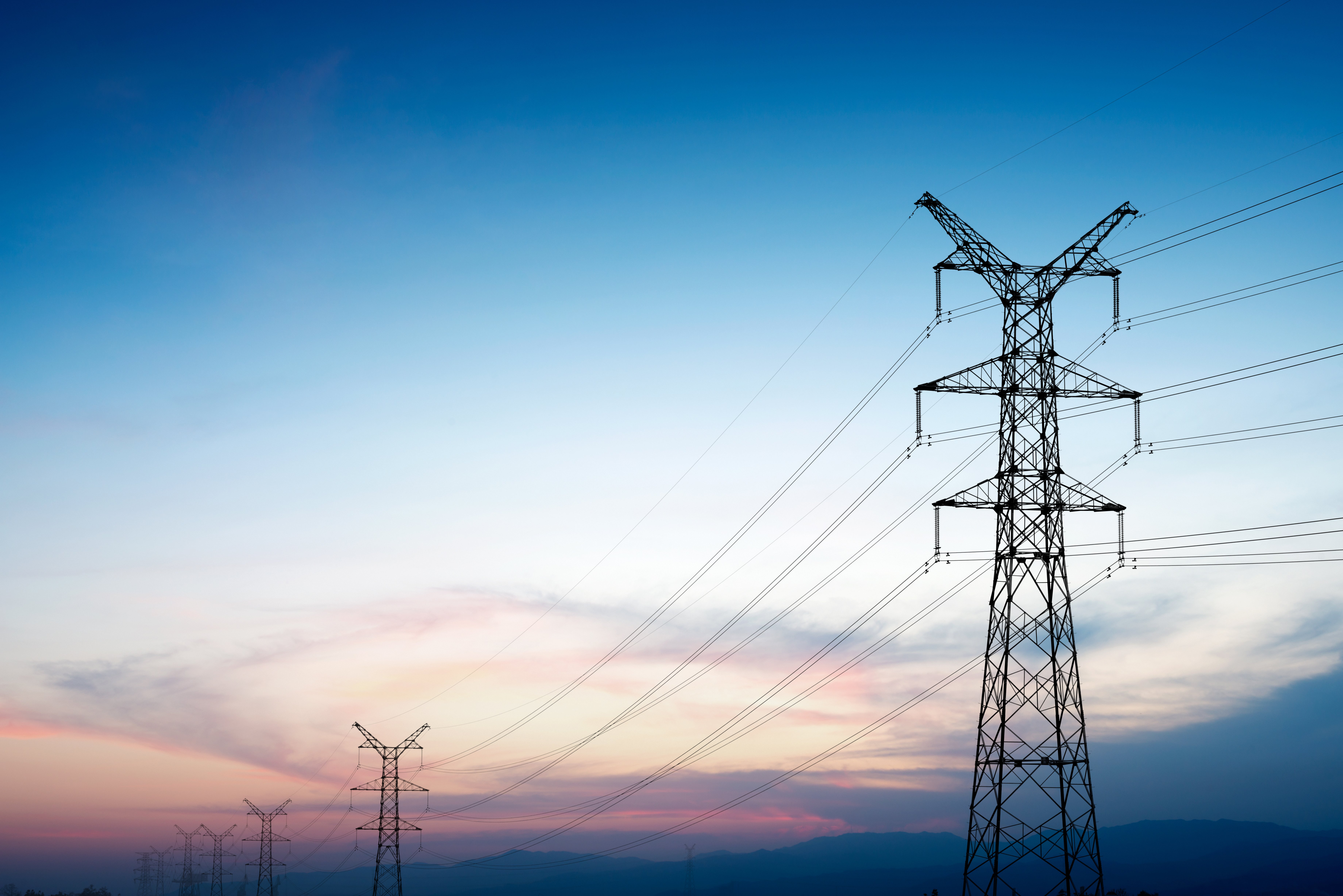 power lines rising representing electricity prices increasing